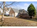 Brick and siding ranch home with 2-car garage at 13931 Pine Harbor Rd, Charlotte, NC 28278