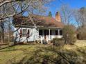 Charming ranch home with red shutters and a front porch at 213 Wood Duck Ct, Gastonia, NC 28056