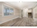 Dining room with hardwood floors and neutral color palette at 155 Mcadam Ln, Mooresville, NC 28117
