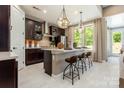 Open kitchen featuring island with seating and updated fixtures at 5089 Valita Rd, York, SC 29745