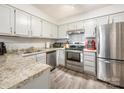 Well-equipped kitchen with granite countertops and stainless steel appliances at 7223 Winery Ln, Charlotte, NC 28227