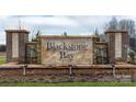 Stone community entrance sign with water feature for Blackstone Bay neighborhood at 4360 Bronze Blvd, Sherrills Ford, NC 28673