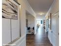 Bright and spacious foyer with hardwood floors and built-in bench at 8020 Plymouth Dr, Sherrills Ford, NC 28673