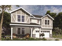Two-story home with a large front porch at 1503 Laggan Ln # 58- Gaines Td, Indian Trail, NC 28079