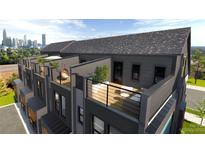 Modern townhome community with rooftop decks and city views at 3024 Khan Park Dr # 65, Charlotte, NC 28206