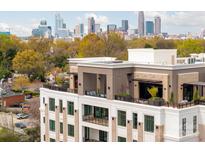 Luxury condo with city skyline view and rooftop terrace at 130 Cherokee Rd # 102, Charlotte, NC 28207