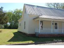House with metal roof and porch at 710 Austin St # 124, Albemarle, NC 28001