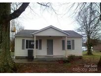 House front view showcasing a covered porch at 910 Delview Rd, Cherryville, NC 28021