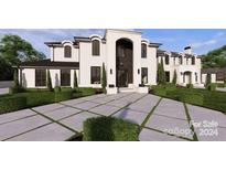 Stunning two-story home with a large driveway at 14007 Point Lookout Rd, Charlotte, NC 28278