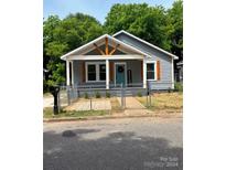 Charming craftsman style home with welcoming front porch at 115 Palmer St, Shelby, NC 28150