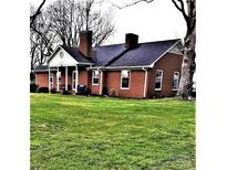 Brick ranch house with a large yard at 12560 Highway 601 Hwy, Midland, NC 28107