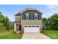 Two-story craftsman home with gray siding and stone accents at 610 Cashion Rd, York, SC 29745