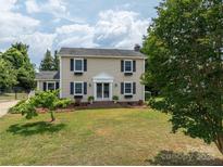 Two story house with manicured lawn and landscaping at 634 Carson Rd, Gastonia, NC 28052