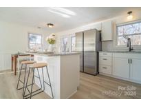 Modern kitchen with stainless steel appliances and granite countertops at 2594 Cedar Valley Dr, Conover, NC 28613