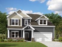 Two-story house with gray siding and stone accents at 630 Rafferty Hill Nw Dr, Concord, NC 28027