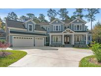 Two-story home with attached three car garage at 001 Beatties Ford Rd, Huntersville, NC 28078