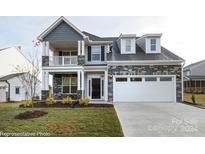 Two-story home with gray siding and stone accents at 1465 Ardmore Dr # 237, Sherrills Ford, NC 28673