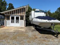 Property with RV, boat, and detached garage at 332 Mount View Ln, New London, NC 28127