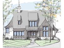 Two-story home with front porch and landscaping at 324 Walnut St, Davidson, NC 28036