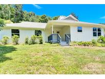 Newly renovated single story home with covered porch at 8433 Rittenhouse Cir, Charlotte, NC 28270