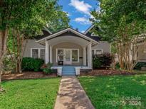 Charming craftsman home with a covered front porch at 510 5Th St, Spencer, NC 28159