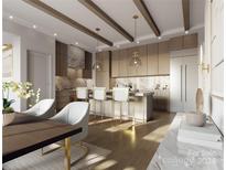 Modern kitchen with marble countertops and island at 409 Queens Rd # 403, Charlotte, NC 28207