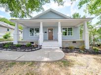 Newly renovated light blue house with front porch at 253 Franklin Nw Ave, Concord, NC 28025