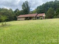 Ranch-style home with a large yard and mature trees at 1089 Cedar Springs Rd, York, SC 29745