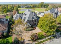 Luxury home on golf course with large lot and mature trees at 300 Eagle Bend Dr, Waxhaw, NC 28173