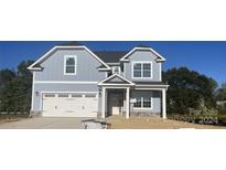 Two-story home with gray siding and white trim at 4684 Hopsack Dr # Cal0105, Indian Trail, NC 28079