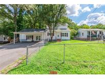 Ranch-style home with carport and fenced yard at 1158 Evans Ave, Rock Hill, SC 29732