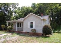 Cozy one-story house with a covered porch at 203 West Dr, Albemarle, NC 28001