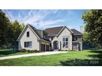 Modern two story home with large windows and attached two car garage at 11031 Harrisons Crossing Ave, Charlotte, NC 28277