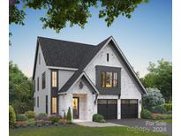 Two-story home with modern design and landscaping at 3013 Kinger Ln, Matthews, NC 28105