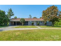 Ranch-style house with carport and spacious lawn at 5625 Highway 601 Hwy, Salisbury, NC 28147