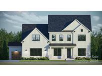 Modern farmhouse exterior with dark roof at 8825 Wingard Rd, Waxhaw, NC 28173