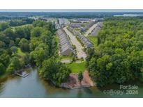 Aerial view of waterfront townhomes with lake access and community amenities at 160 Beacon Dr # D, Mooresville, NC 28117