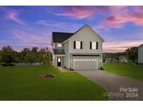 Two-story house with gray siding and lawn at 107 Dublin Ct, Statesville, NC 28677