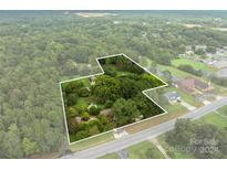 Aerial view of property showing house and surrounding land at 4539 S New Hope Rd, Gastonia, NC 28056