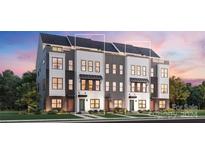 Modern townhomes with three-story elevations, neutral colors at 443 Blairhill Rd # 6, Charlotte, NC 28217