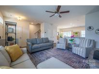 Cozy living room with sectional sofa and accent chairs at 5013 Patton Dr, Gastonia, NC 28056