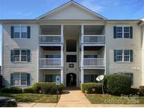 Apartment building exterior with balconies at 4432 Eaves Ln, Charlotte, NC 28215