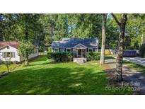 Aerial view of a charming house with a green lawn at 114 Gregg W St, Fort Mill, SC 29715