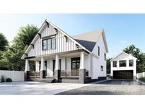 Two-story craftsman style home with detached garage at 214 Seldon Dr, Charlotte, NC 28216