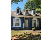 Blue house exterior with white accents, and a welcoming front entrance at 5720 Ebley Ln, Charlotte, NC 28227