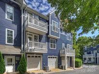 Three-story townhome with attached garage at 1556 Walnut View Dr, Charlotte, NC 28208