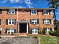 Brick apartment building with ample parking at 916 Mcalway Rd # D, Charlotte, NC 28211