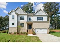 Two-story home with gray siding and brick accents at 3192 Timber Run Ln, Maiden, NC 28650