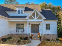 Charming two-story home with a covered front porch and inviting entryway at 409 19Th Ave Nw Cir # 12, Hickory, NC 28601