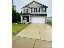 Two-story house with gray siding and a two-car garage at 229 Lake George Dr, Shelby, NC 28152